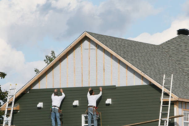 Professional Siding technician working in Oxford, GA